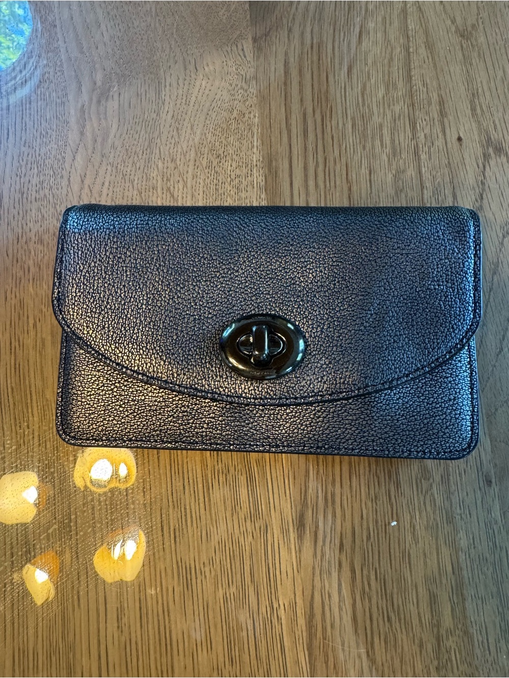 COACH CLUTCH WALLET IN METALLIC GREY turn lock